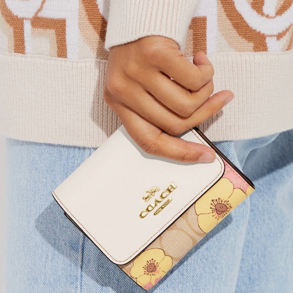 Coach CH719 Small Trifold Wallet In Signature Canvas With Floral Cluster Print.